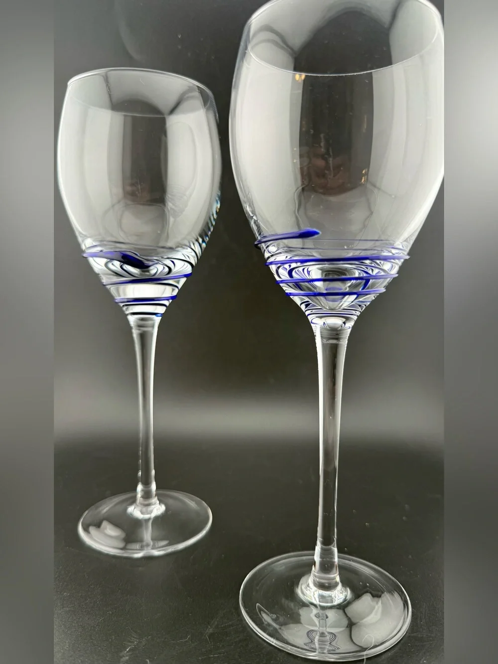 2 Pier 1 P1C44 blue swirl wine glasses. 10oz